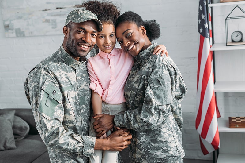 Military family hugging
