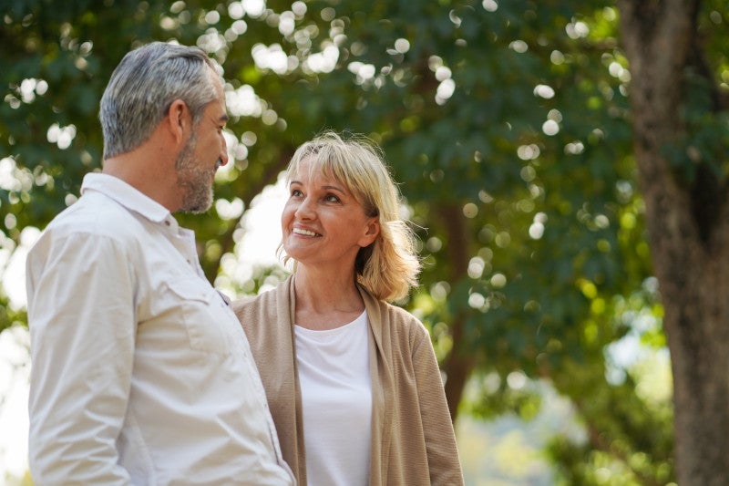 Retired Couple smiling at each other